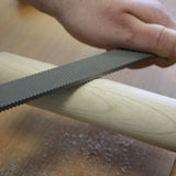 andle: stained hornbeam wood, waxed  Blade: carbon steel, hardness 60 HRc Use: Milled-tooth file possess extremely sharp teeth whose curved edges automatically impart a shearing cut. They cut faster than other files and leave a smoother finish than rasps..